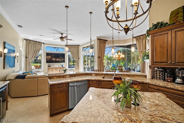 kitchen with hanging light fixtures, dishwasher, and ceiling fan with notable chandelier