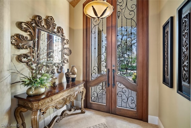 entryway featuring french doors