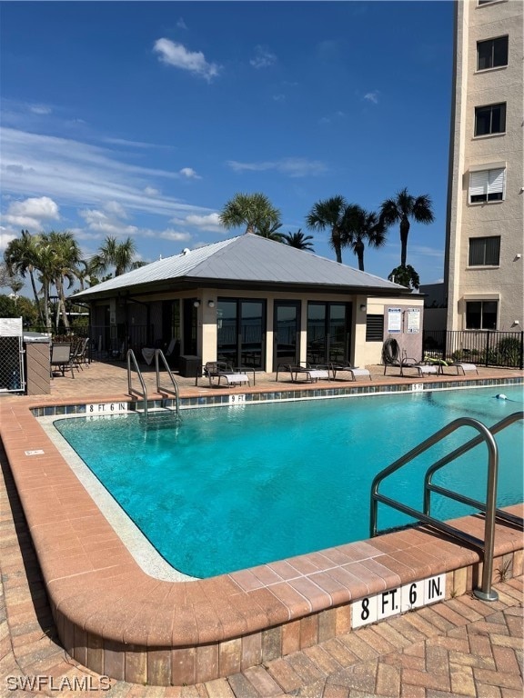 view of pool featuring a patio area