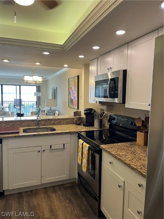 kitchen with black electric range oven, dark hardwood / wood-style floors, sink, crown molding, and white cabinetry