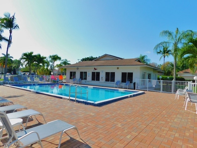 view of pool featuring a patio