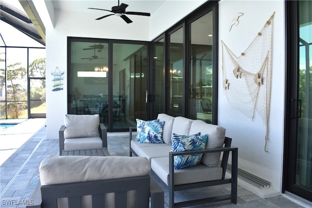 view of patio / terrace featuring a lanai, an outdoor hangout area, and ceiling fan