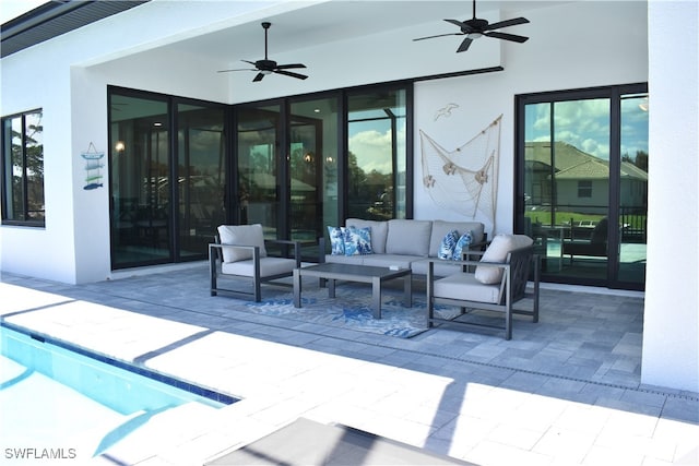 view of patio featuring an outdoor hangout area and ceiling fan