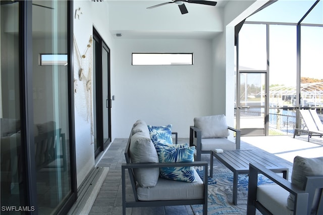 living room with ceiling fan