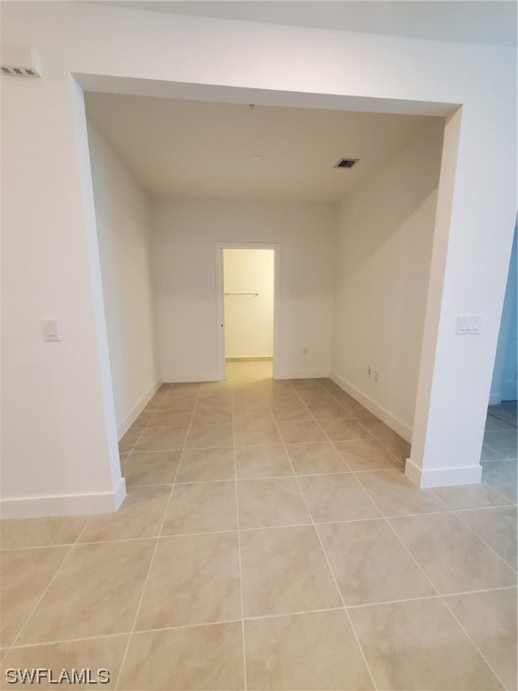 view of tiled spare room