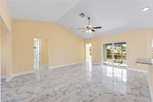 tiled empty room featuring ceiling fan and high vaulted ceiling