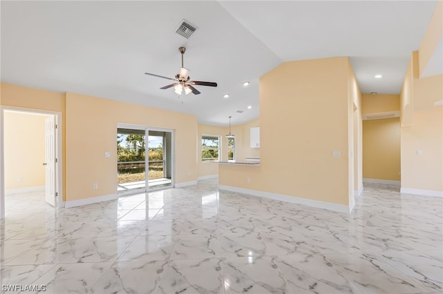 unfurnished living room with lofted ceiling, ceiling fan, and light tile flooring