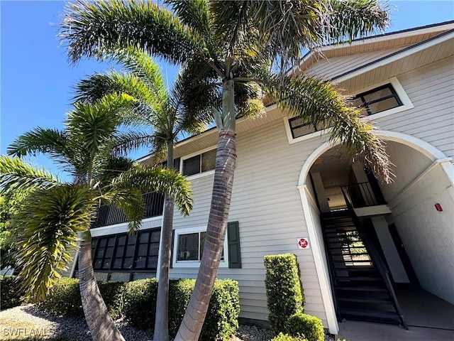 14861 Summerlin Woods Dr Unit 13, Fort Myers, FL 33919 - view of building exterior featuring stairs