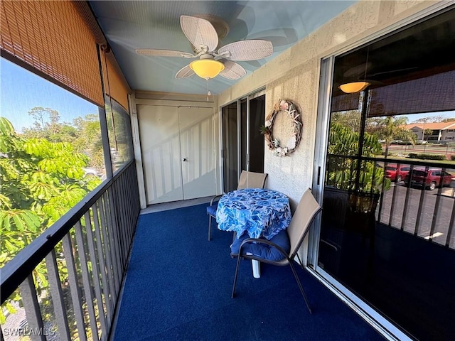 14861 Summerlin Woods Dr Unit 13, Fort Myers, FL 33919 - balcony featuring a ceiling fan
