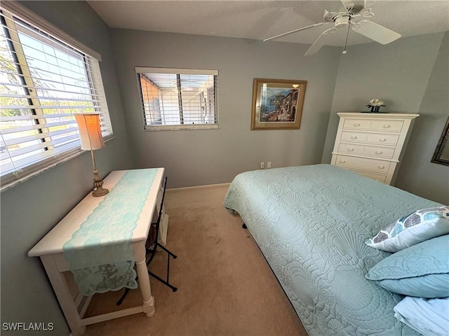 14861 Summerlin Woods Dr Unit 13, Fort Myers, FL 33919 - bedroom featuring carpet and a ceiling fan