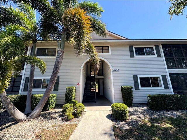 14861 Summerlin Woods Dr Unit 13, Fort Myers, FL 33919 - view of front of house with stairway