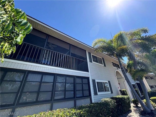 14861 Summerlin Woods Dr Unit 13, Fort Myers, FL 33919 - view of building exterior with a garage