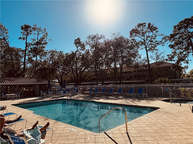 view of pool featuring a patio area