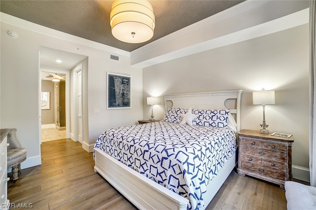 bedroom featuring light hardwood / wood-style floors