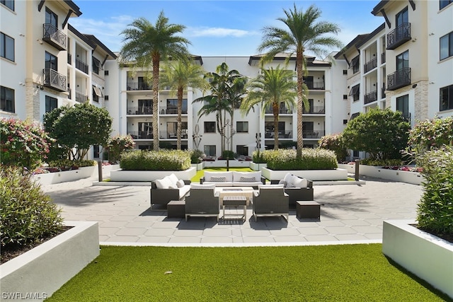 surrounding community featuring a patio area