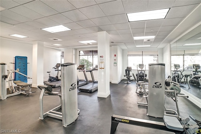 workout area with a drop ceiling