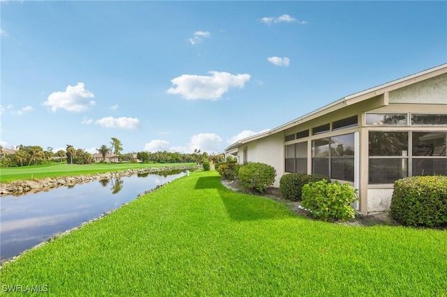 view of yard featuring a water view