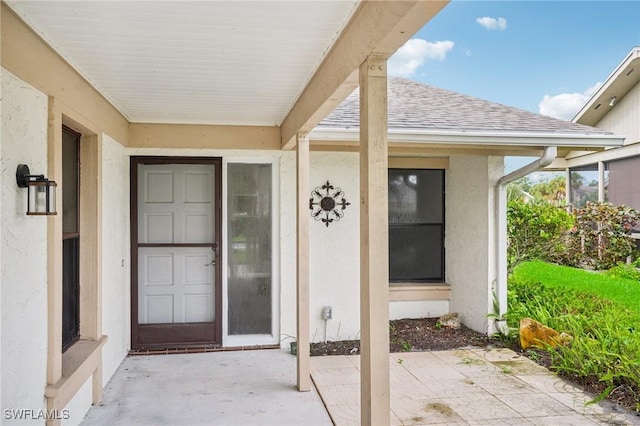 entrance to property featuring a patio area