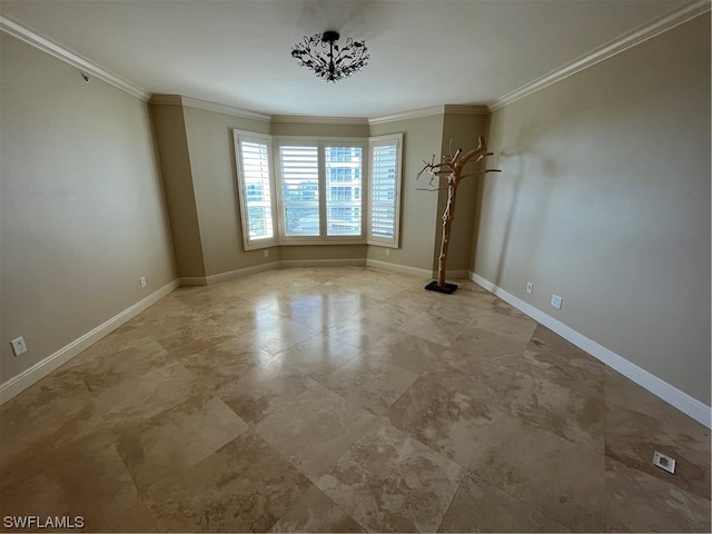 tiled spare room with a chandelier and ornamental molding