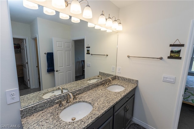 bathroom featuring double vanity