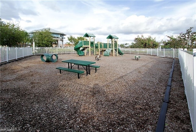 community play area featuring fence