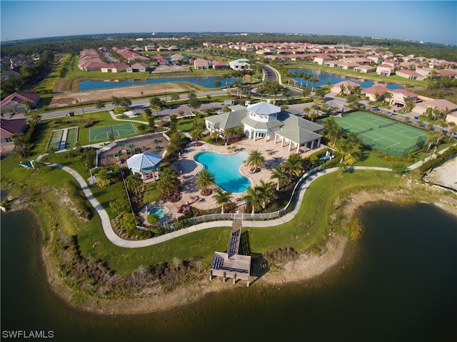 drone / aerial view with a water view