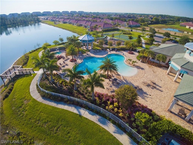 bird's eye view with a water view