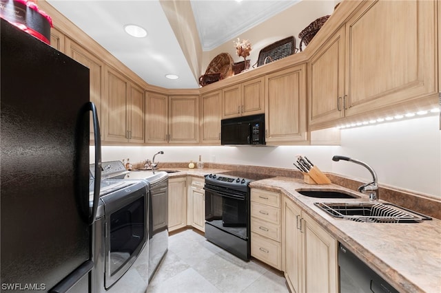 kitchen featuring washer and clothes dryer, black appliances, sink, ornamental molding, and light brown cabinetry