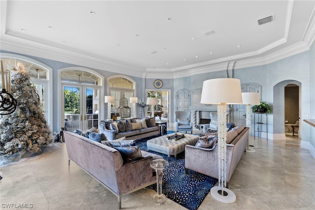 living room with crown molding and french doors