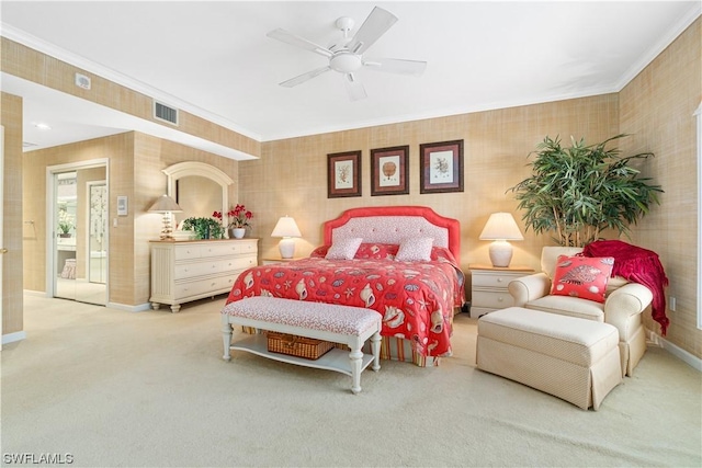 bedroom featuring ceiling fan, carpet flooring, and crown molding