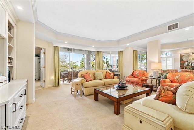 carpeted living room featuring ornamental molding