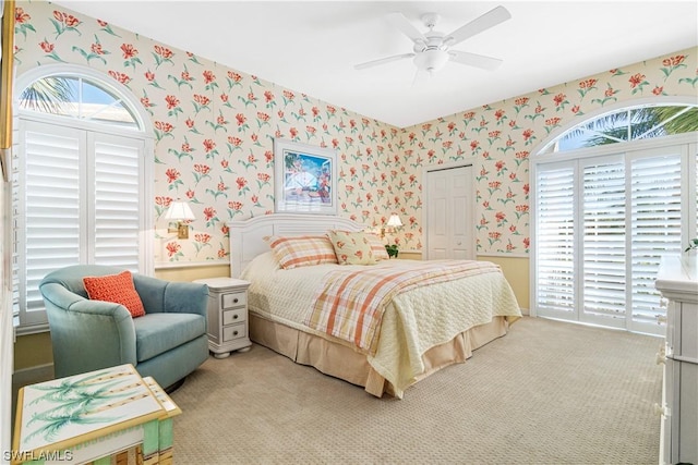 carpeted bedroom featuring ceiling fan