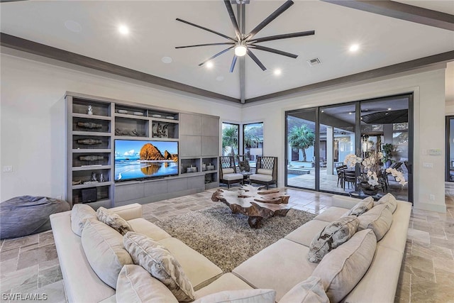 tiled living room with ceiling fan, built in shelves, and lofted ceiling