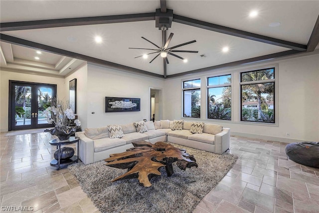 living room featuring french doors, light tile flooring, and a wealth of natural light