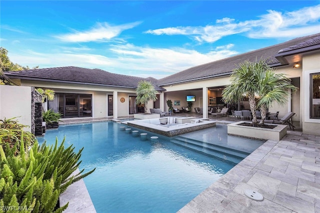 view of pool with a patio area