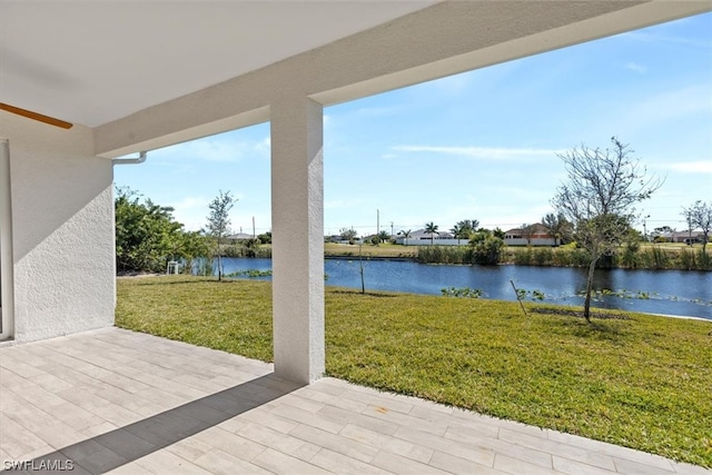 view of patio / terrace with a water view