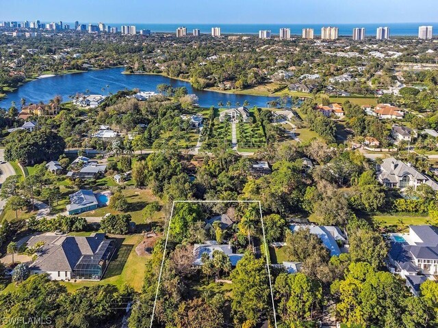 drone / aerial view with a water view