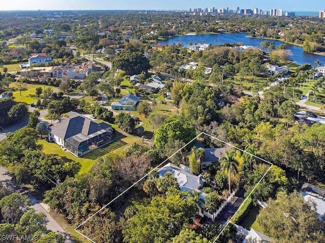 bird's eye view with a water view
