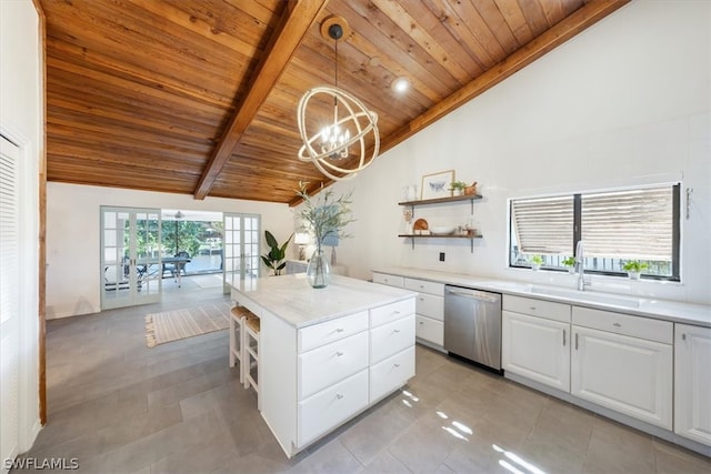 kitchen with hanging light fixtures, white cabinets, wood ceiling, plenty of natural light, and dishwasher