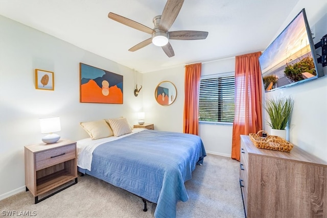 bedroom featuring ceiling fan and carpet floors