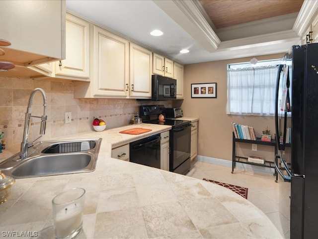 kitchen featuring backsplash, black appliances, sink, a raised ceiling, and crown molding