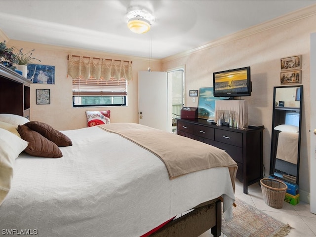 bedroom featuring ceiling fan, ornamental molding, and light tile floors