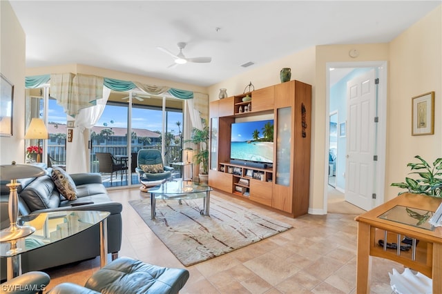 living room featuring ceiling fan