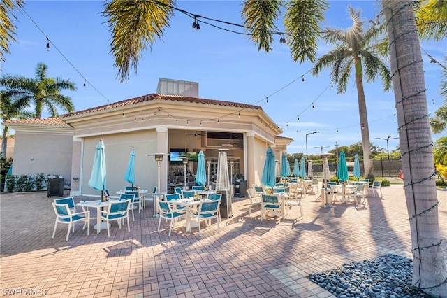 view of patio with ceiling fan