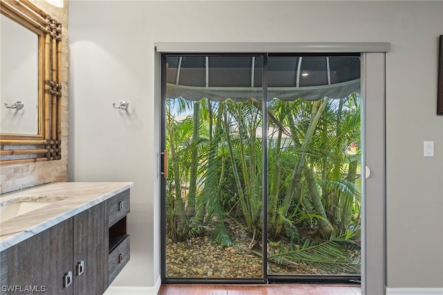 bathroom featuring vanity and wood-type flooring