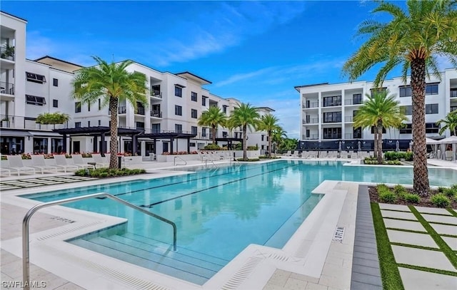 view of swimming pool with a pergola and a patio area