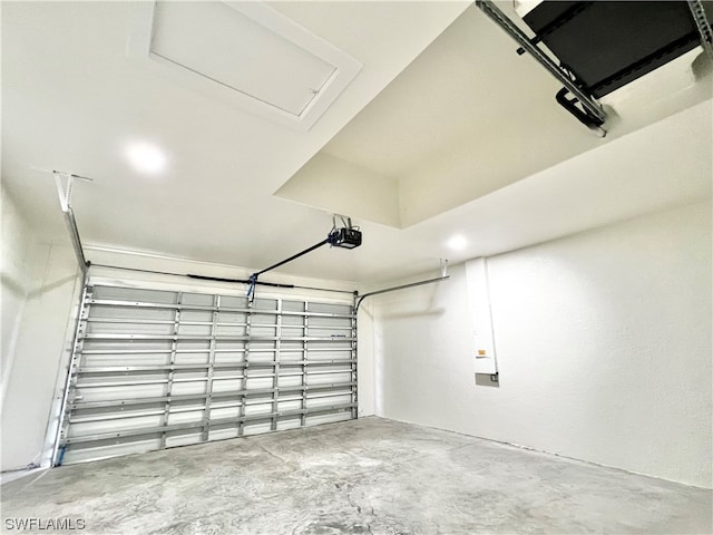 garage featuring a garage door opener