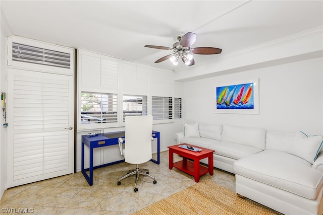 office space with light tile floors, ceiling fan, and ornamental molding