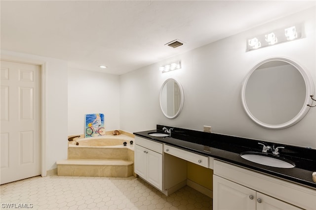 bathroom with a bath, double sink vanity, and tile flooring