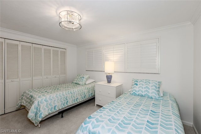 bedroom featuring crown molding, a closet, and light colored carpet